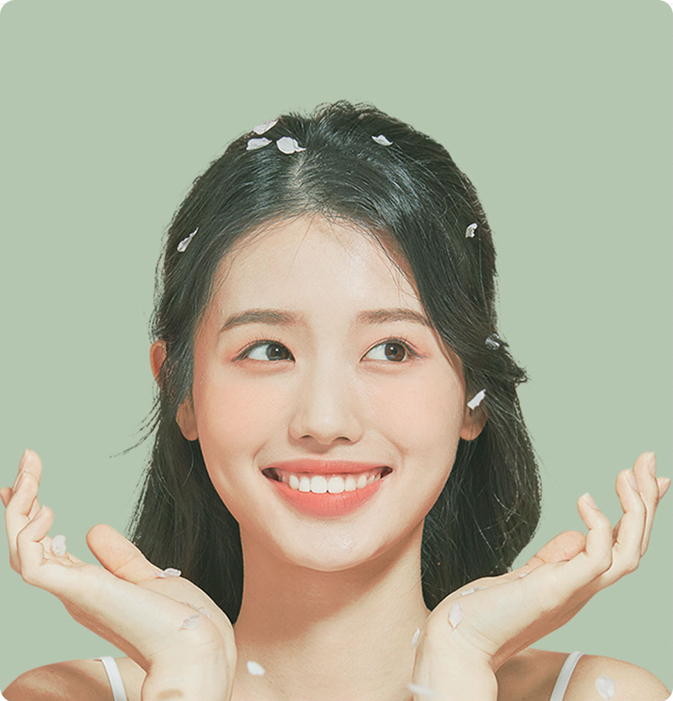 Model holding her face with both hands - concerns about skin elasticity and sagging